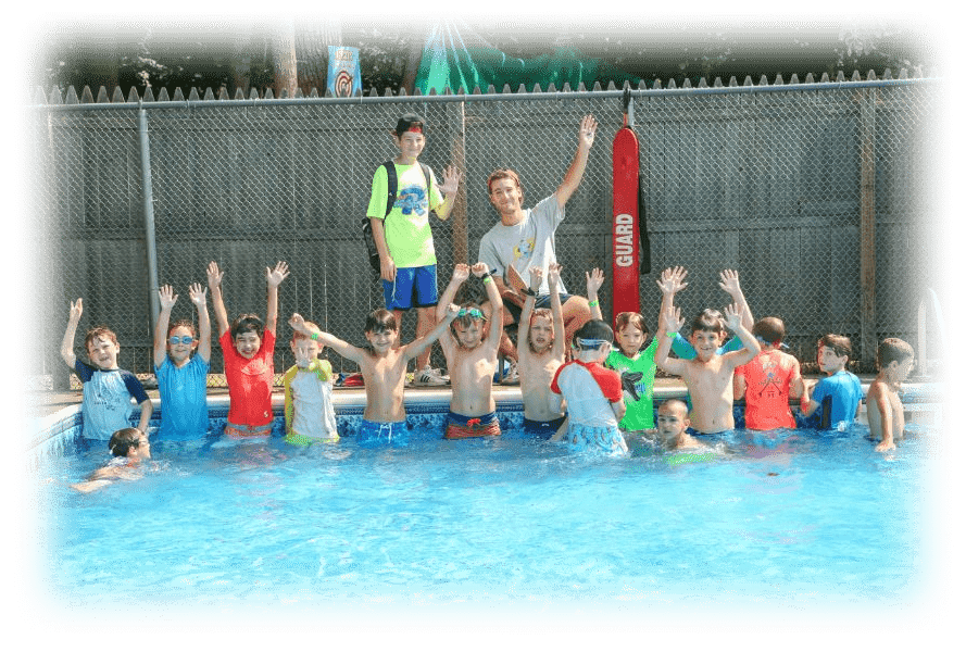 Group of boys in a swimming pool at Regesh