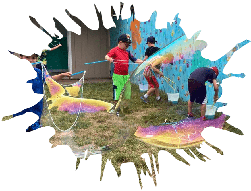 Campers making giant bubbles