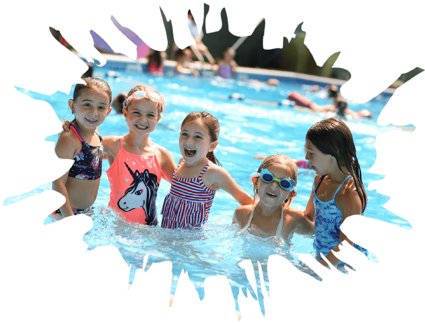 Group of girls laughing and swimming in a pool