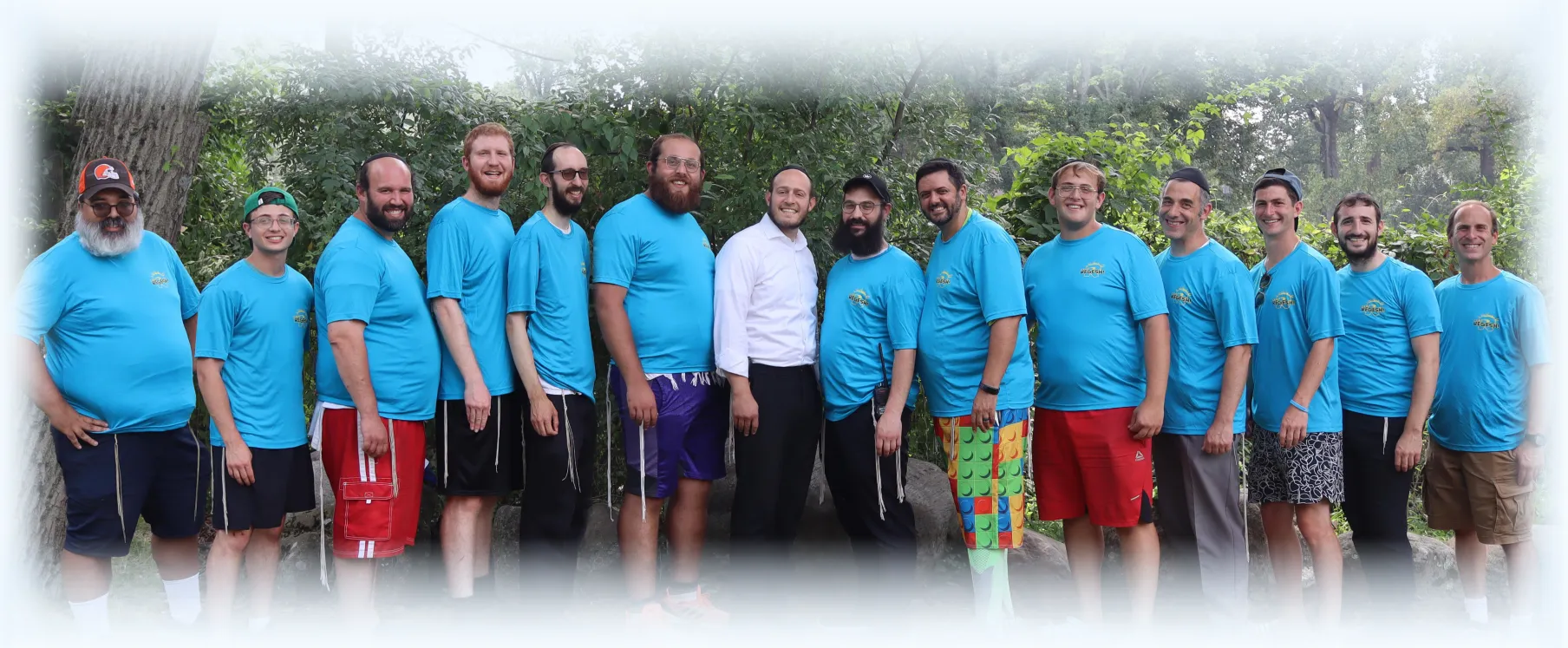 Group of male camp staff at Regesh